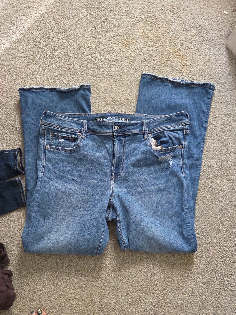 American Eagle Outfitters Blue Flare Jeans with Raw Hem
